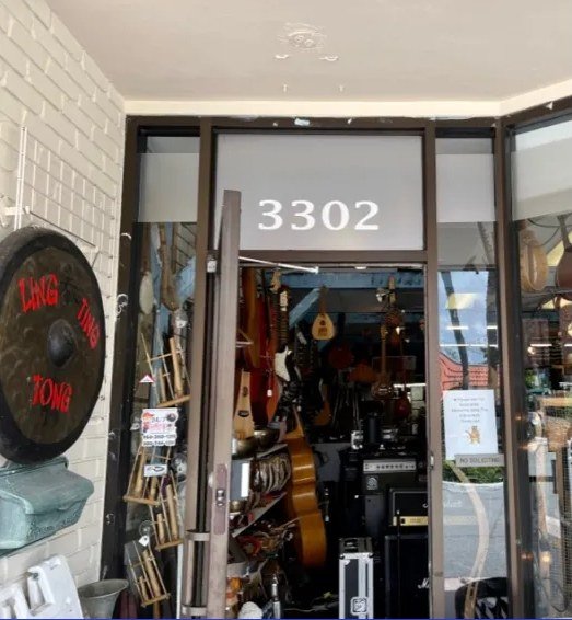 Instruments hanging inside the entrance of Full Circle Music, Inc.